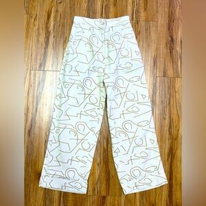 Ali Golden raw silk pant. Abstract design.